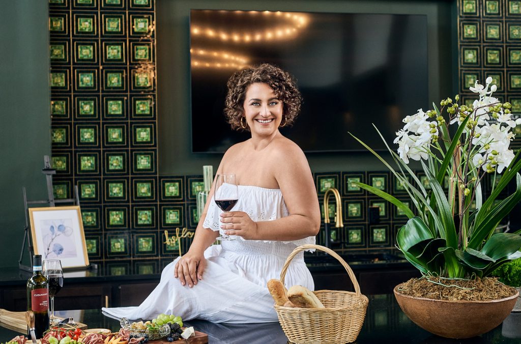 Graze & Prosper lifestyle branding photo in kitchen with wine and charcuterie spread