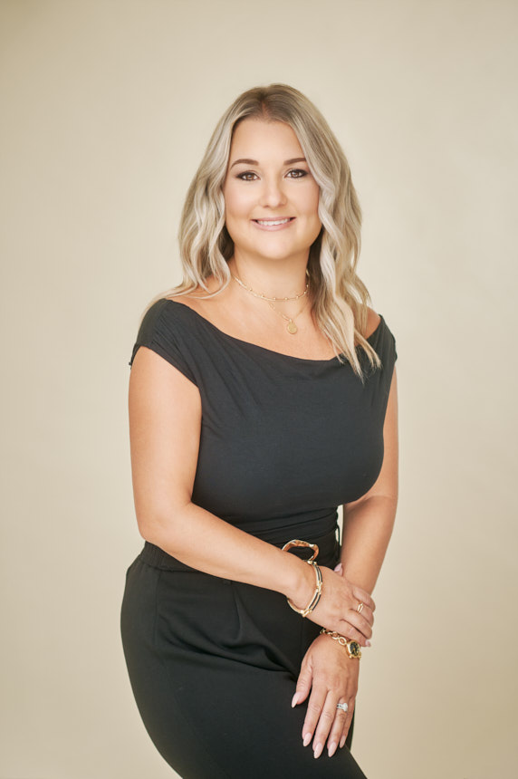Ashley Yates professional Realtor headshot from an Ocala real estate branding session